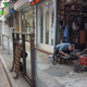 A man cutting some sheet metal with an angle grinder